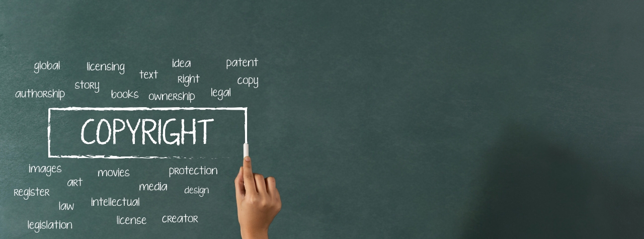 A hand holding a piece of white chalk is shown writing on a green chalkboard. The word "COPYRIGHT" is written in large, capital letters inside a hand-drawn white box. Surrounding the box are various words, including "images," "art," "register," "law," "movies," "intellectual," "media," "protection," and "design."